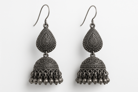 Traditional oxidized jhumkas with ghungroo detailing. Lightweight and handmade.