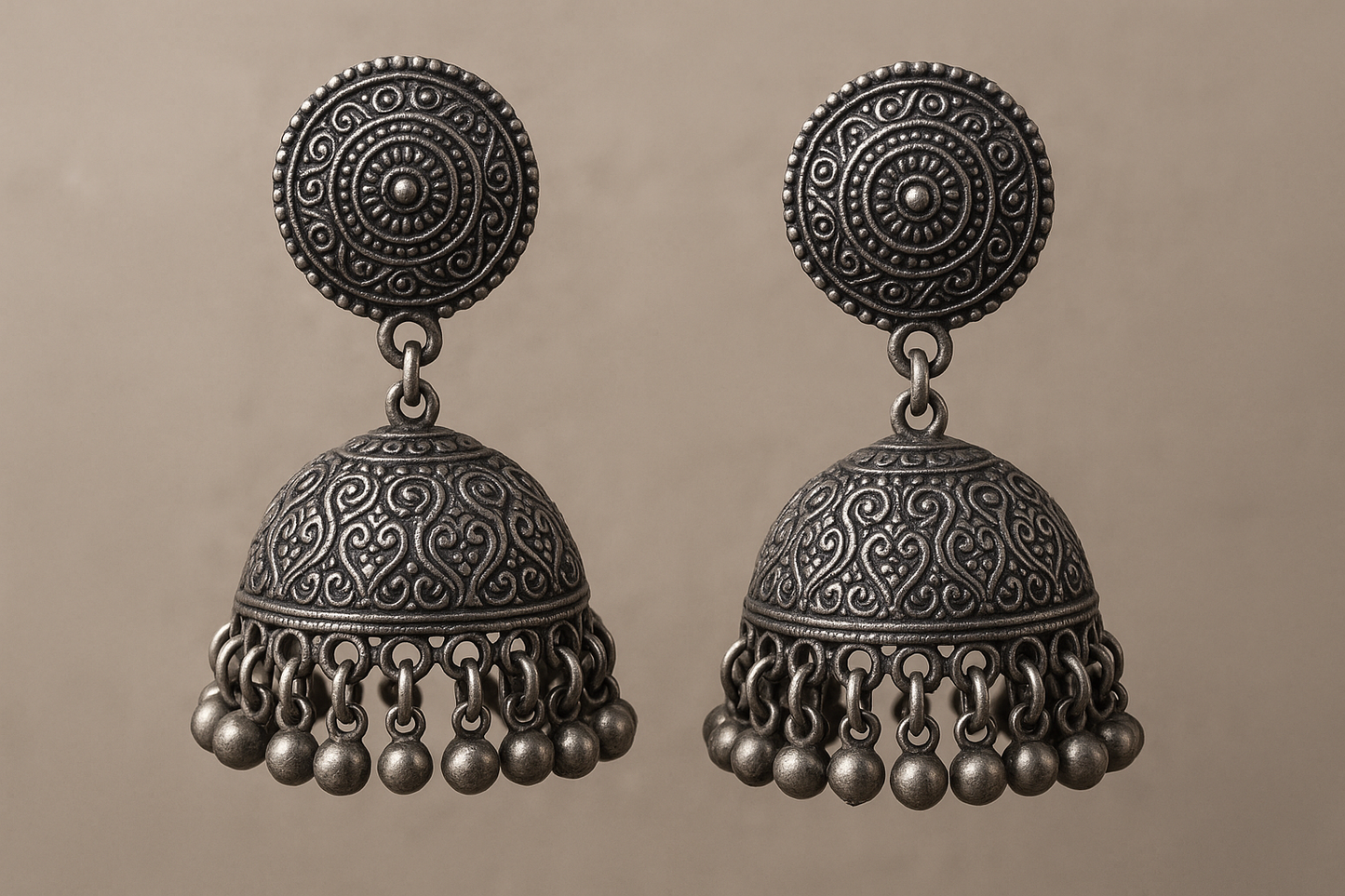Traditional oxidized jhumkas with ghungroo detailing. Lightweight and handmade.