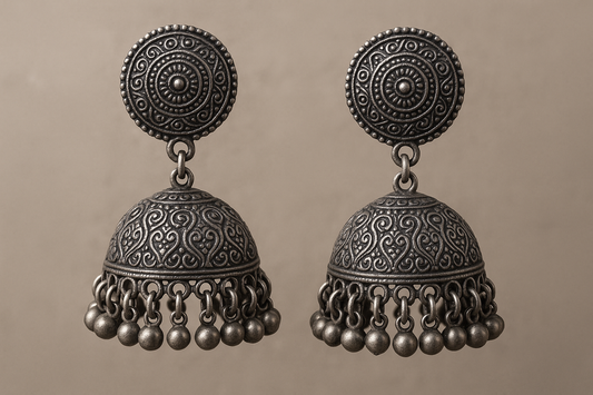 Traditional oxidized jhumkas with ghungroo detailing. Lightweight and handmade.