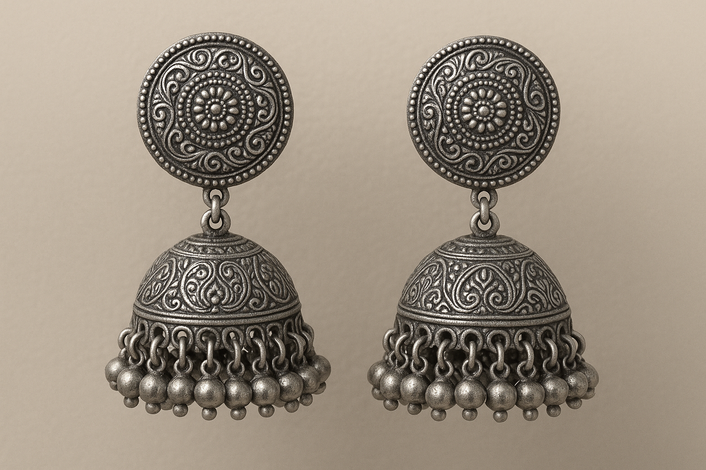 Traditional oxidized jhumkas with ghungroo detailing. Lightweight and handmade.
