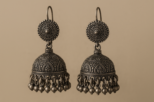 Traditional oxidized jhumkas with ghungroo detailing. Lightweight and handmade.