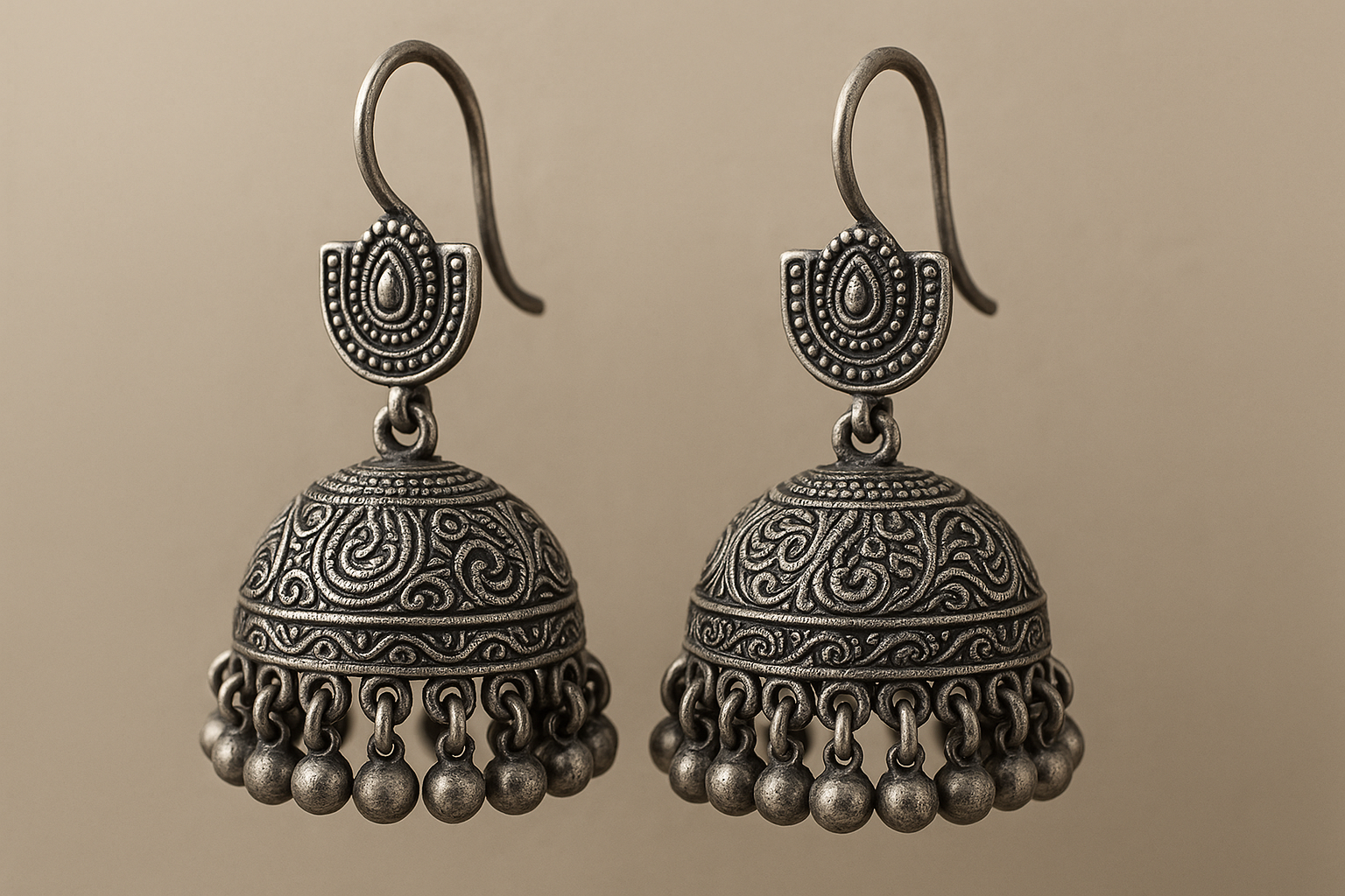 Traditional oxidized jhumkas with ghungroo detailing. Lightweight and handmade.