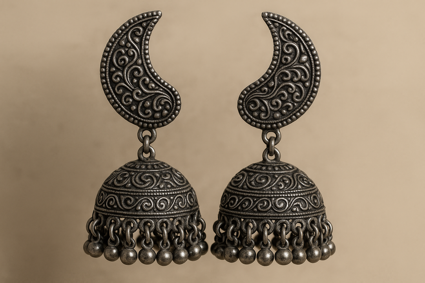 Traditional oxidized jhumkas with ghungroo detailing. Lightweight and handmade.