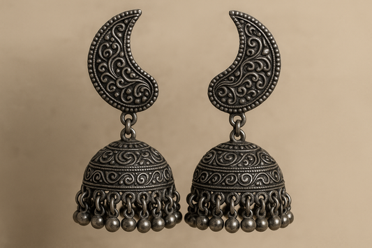 Traditional oxidized jhumkas with ghungroo detailing. Lightweight and handmade.