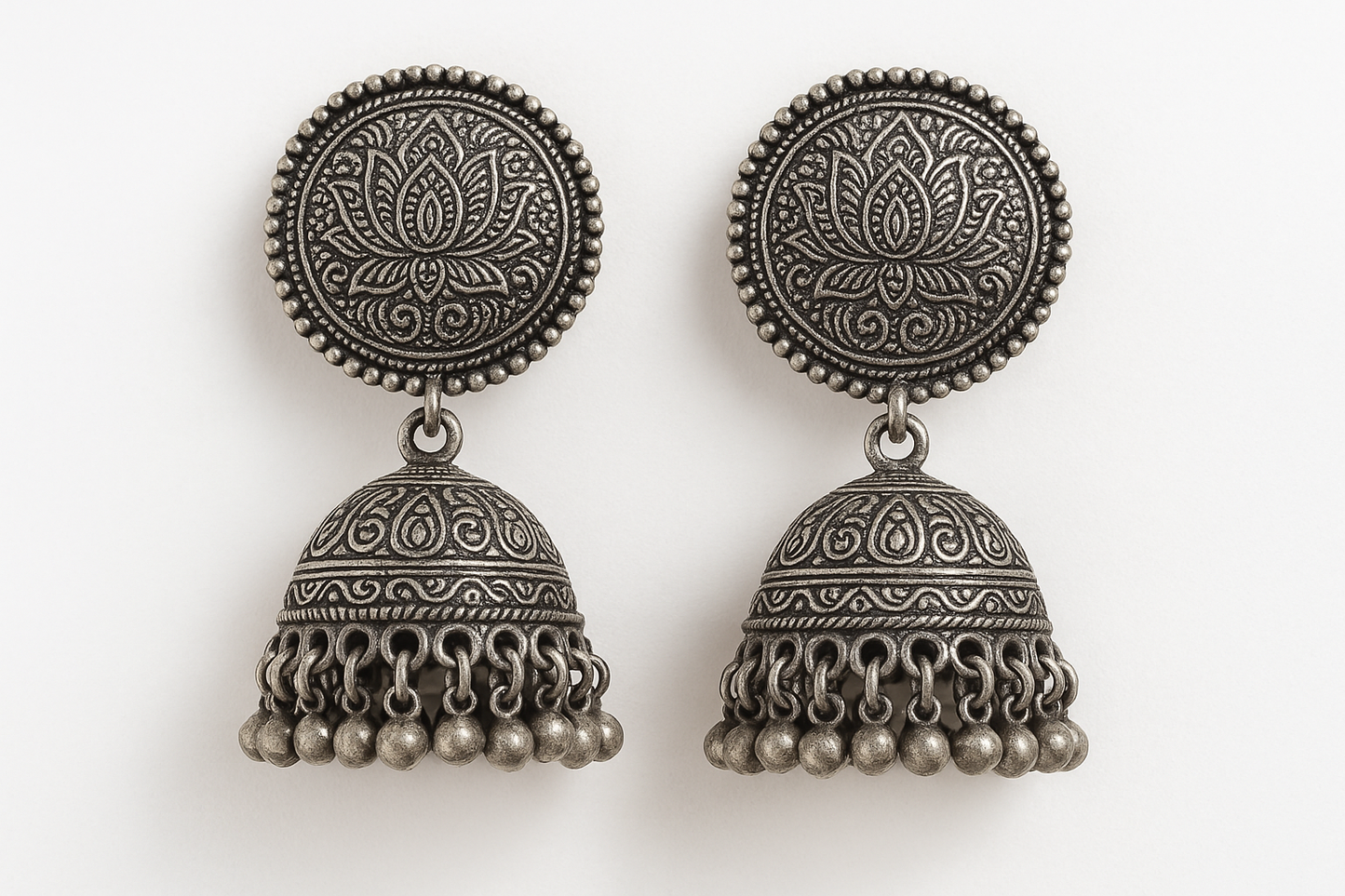 Traditional oxidized jhumkas with ghungroo detailing. Lightweight and handmade.