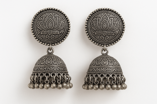 Traditional oxidized jhumkas with ghungroo detailing. Lightweight and handmade.