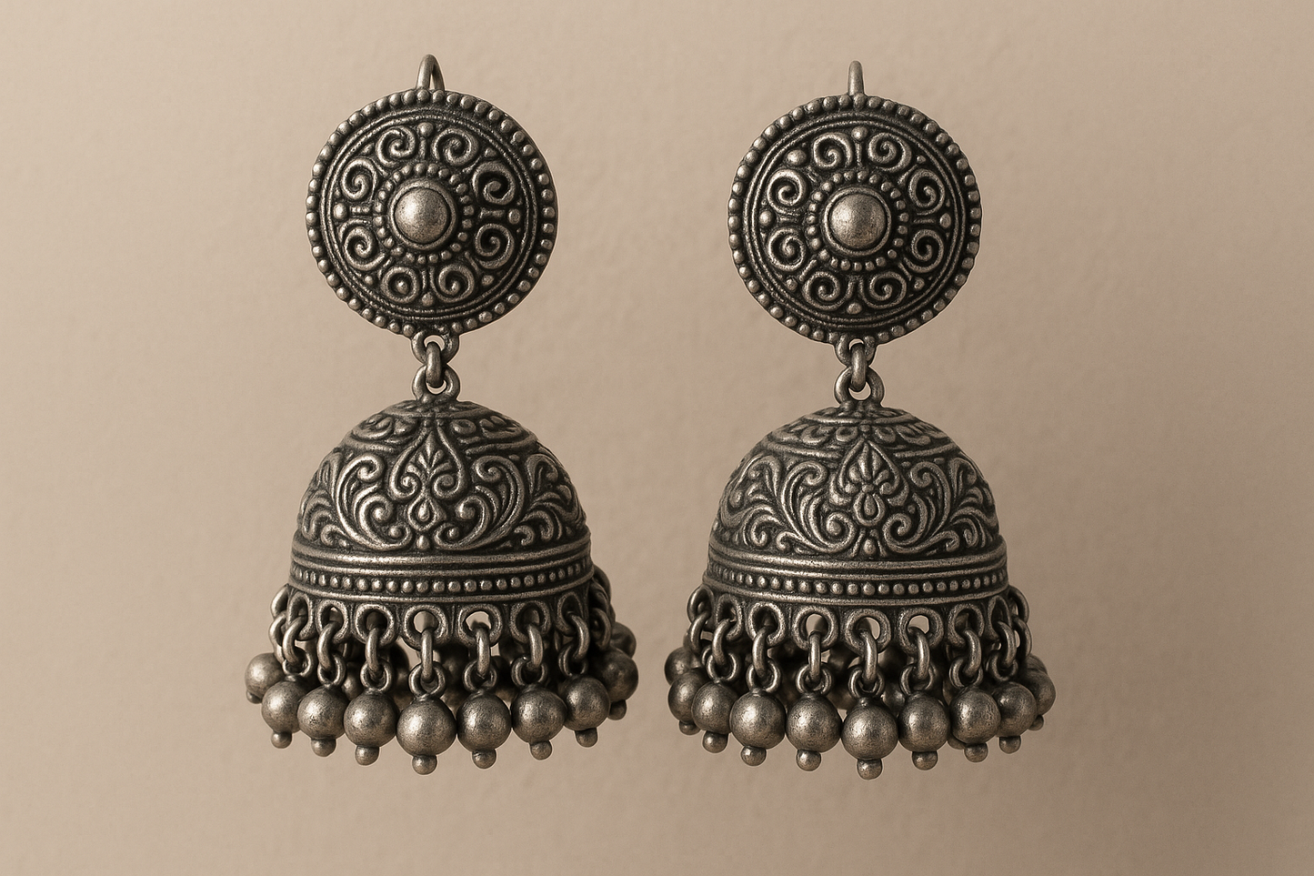 Traditional oxidized jhumkas with ghungroo detailing. Lightweight and handmade.