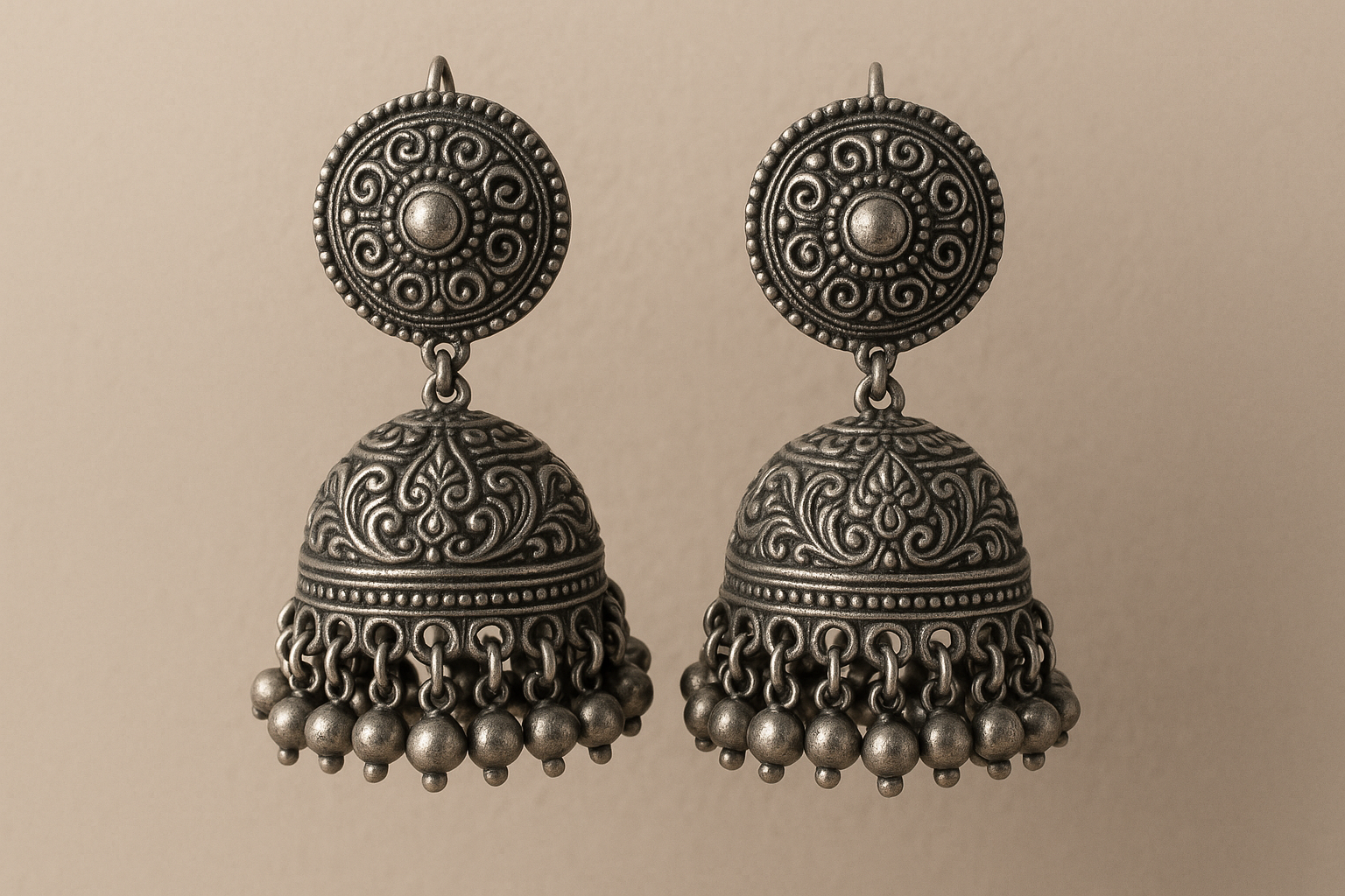 Traditional oxidized jhumkas with ghungroo detailing. Lightweight and handmade.