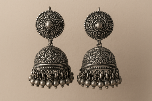 Traditional oxidized jhumkas with ghungroo detailing. Lightweight and handmade.