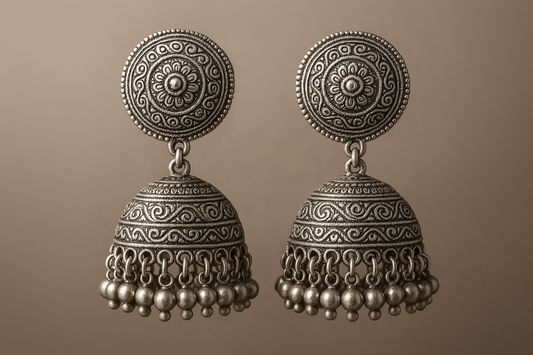 Traditional oxidized jhumkas with ghungroo detailing. Lightweight and handmade.