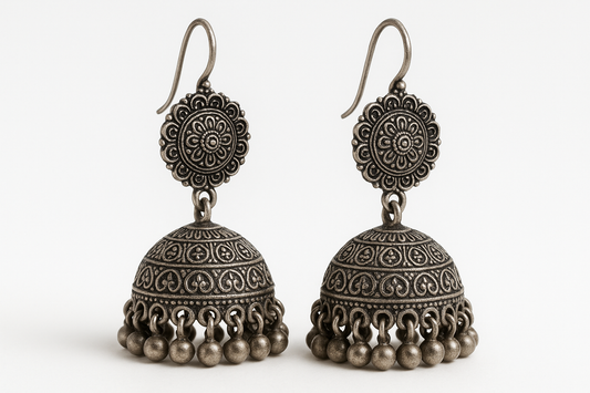 Traditional oxidized jhumkas with ghungroo detailing. Lightweight and handmade.