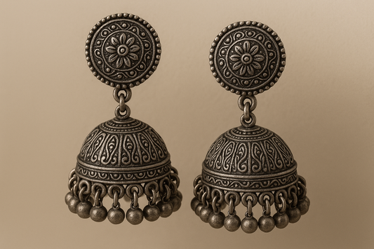 Traditional oxidized jhumkas with ghungroo detailing. Lightweight and handmade.