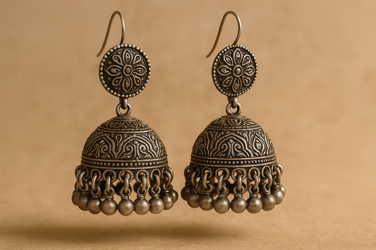 Traditional oxidized jhumkas with ghungroo detailing. Lightweight and handmade.