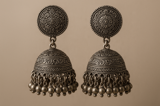 Traditional oxidized jhumkas with ghungroo detailing. Lightweight and handmade.